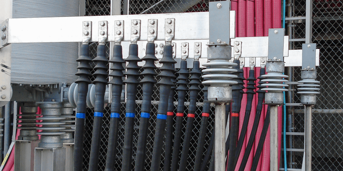 High and medium voltage power cables with terminations connected to industrial switchgear for reliable electrical distribution.