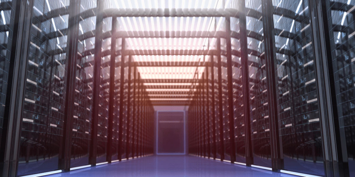 Industrial data center with rows of servers and structured cabling, representing Burkes instrumentation network infrastructure and controls services.
