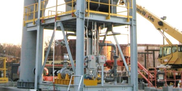 Burkes Mechanical industrial structural steel installation with piping systems, equipment setting, and crane support for heavy mechanical construction projects