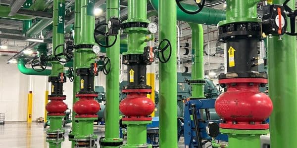 Industrial piping system with valves, gauges, and flow control components for mechanical installation and plant infrastructure systems